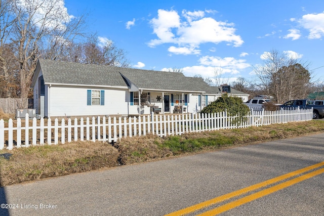 ranch-style home with covered porch