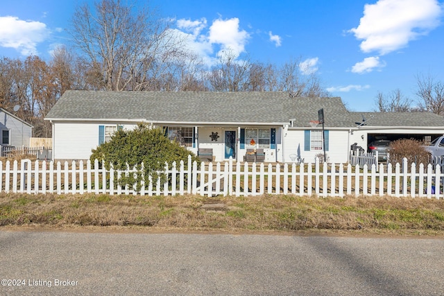 view of front of house featuring a carport