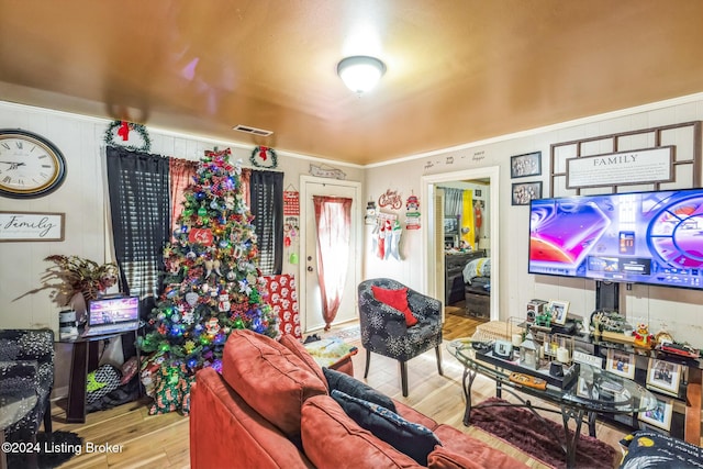 living room with light hardwood / wood-style flooring