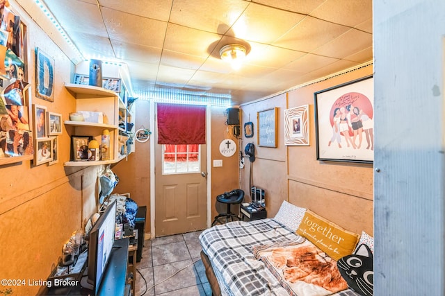 bedroom featuring light tile patterned floors