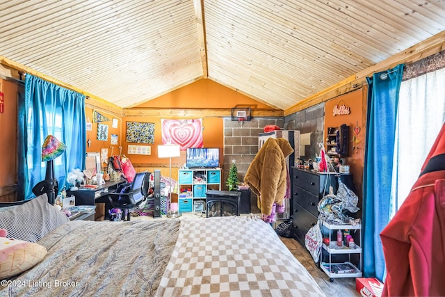 bedroom featuring wood ceiling and vaulted ceiling