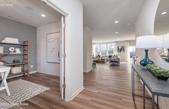 hall featuring hardwood / wood-style floors