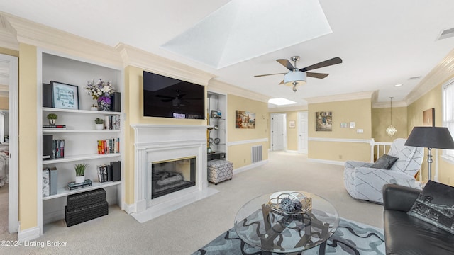 living room with crown molding, built in features, ceiling fan, and light colored carpet