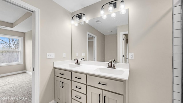 389 Williamsburg Dr, Mt Washington, KY 40047 - full bathroom featuring double vanity, a sink, baseboards, and visible vents