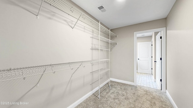 389 Williamsburg Dr, Mt Washington, KY 40047 - walk in closet with visible vents and carpet