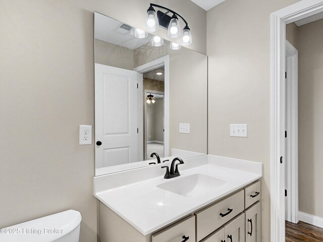 389 Williamsburg Dr, Mt Washington, KY 40047 - bathroom featuring visible vents, a ceiling fan, toilet, and vanity