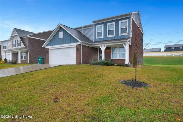 view of front of house with a garage and a front lawn