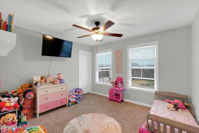 carpeted bedroom featuring ceiling fan