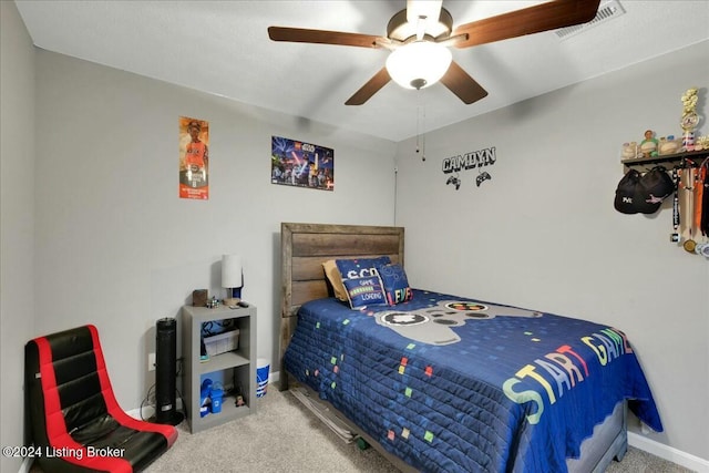 carpeted bedroom featuring ceiling fan