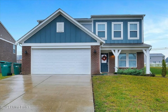 view of front of home featuring a garage and a front lawn