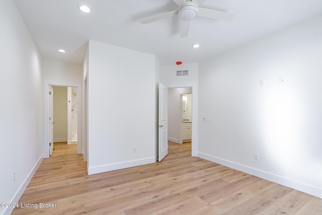 unfurnished bedroom featuring ceiling fan and light hardwood / wood-style floors