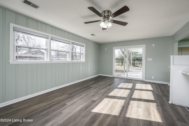 interior space featuring dark hardwood / wood-style floors and ceiling fan