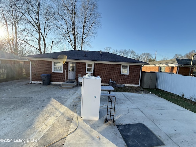 rear view of house featuring a patio