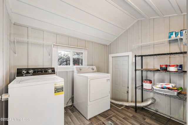 washroom featuring washer and clothes dryer and hardwood / wood-style floors