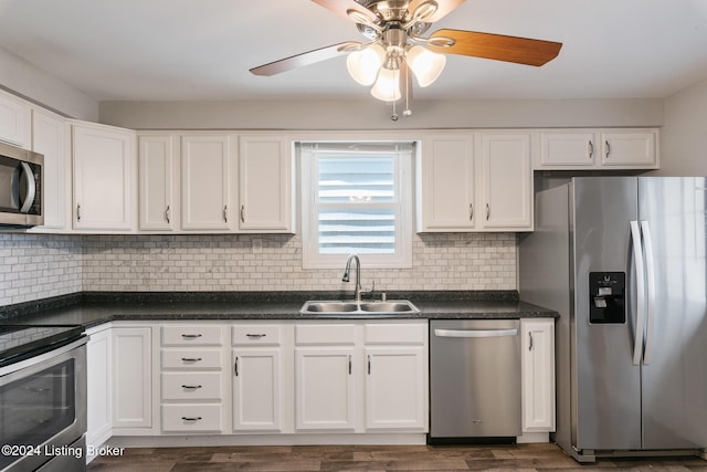 kitchen featuring white cabinetry, sink, and stainless steel appliances