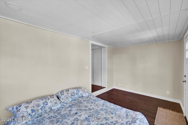 bedroom with hardwood / wood-style flooring