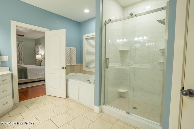 bathroom featuring tile patterned floors and plus walk in shower