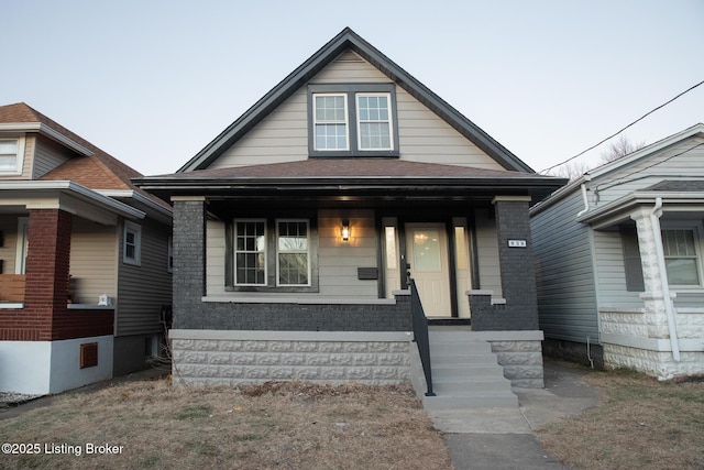 bungalow-style home featuring a porch