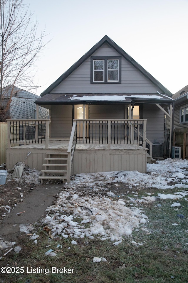 view of front of home featuring central AC unit and covered porch