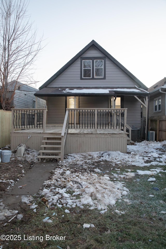 view of front facade with central air condition unit and a porch