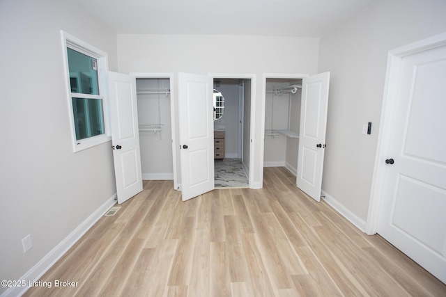 unfurnished bedroom featuring light hardwood / wood-style floors