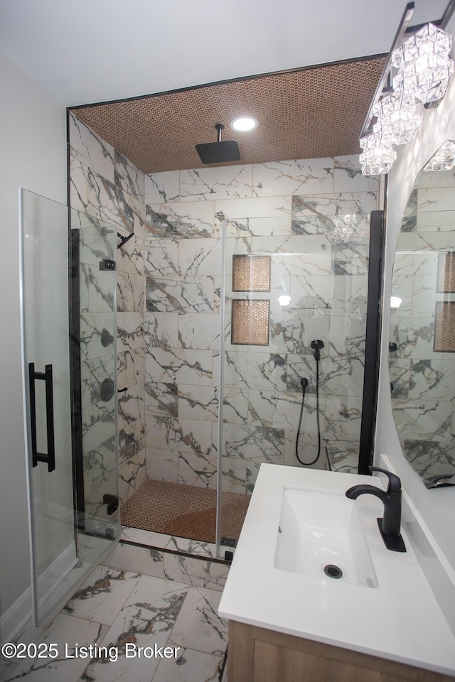 bathroom with vanity and an enclosed shower