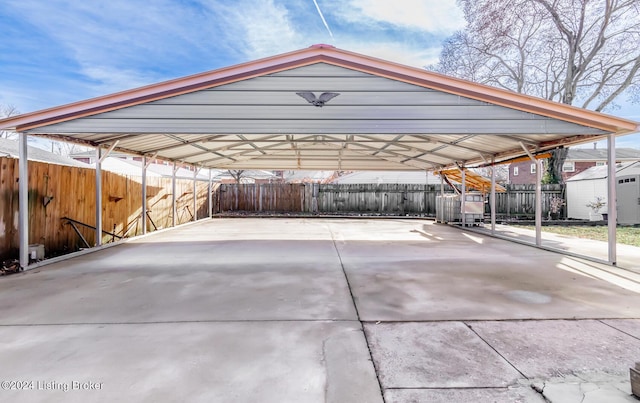 view of vehicle parking with a carport