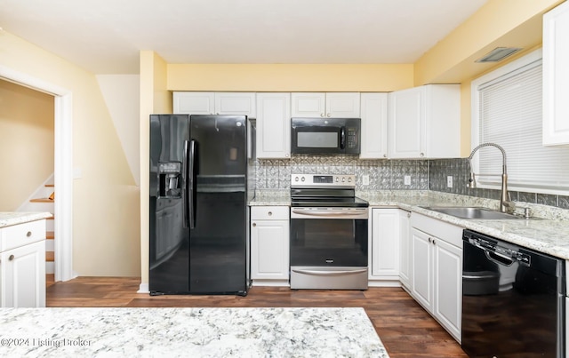 kitchen with decorative backsplash, sink, black appliances, white cabinets, and dark hardwood / wood-style floors