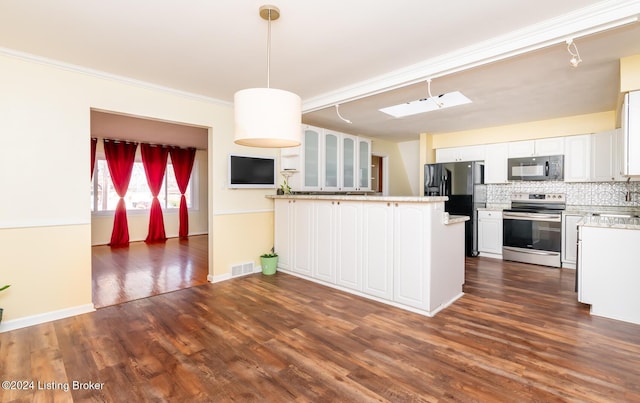 kitchen with black appliances, kitchen peninsula, decorative backsplash, dark hardwood / wood-style flooring, and white cabinetry