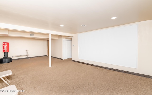 basement with carpet flooring