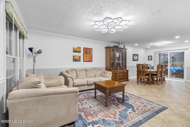 tiled living room featuring a textured ceiling