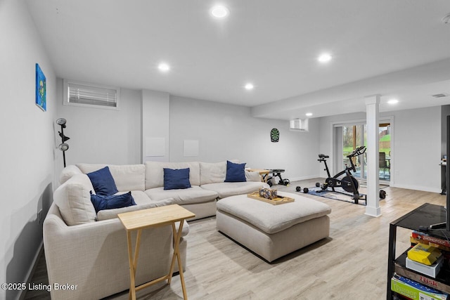 living room with light hardwood / wood-style floors