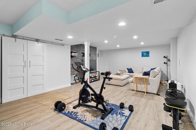 workout area featuring wood-type flooring