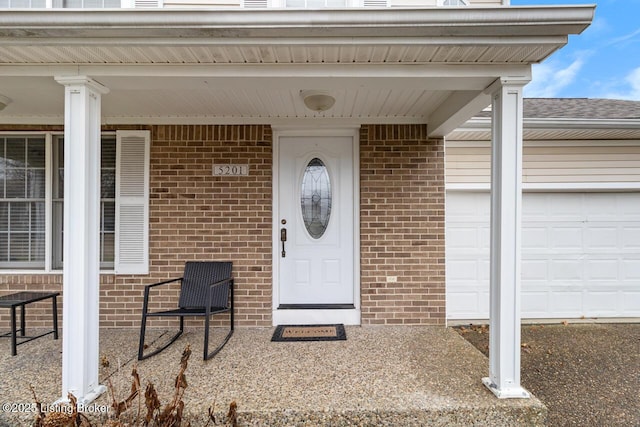 property entrance with a garage