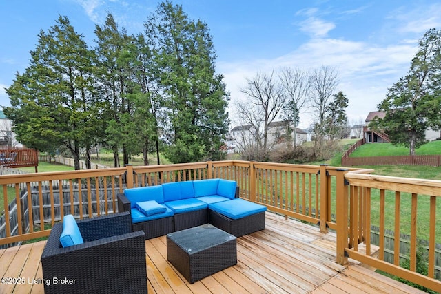 deck with a lawn and an outdoor living space