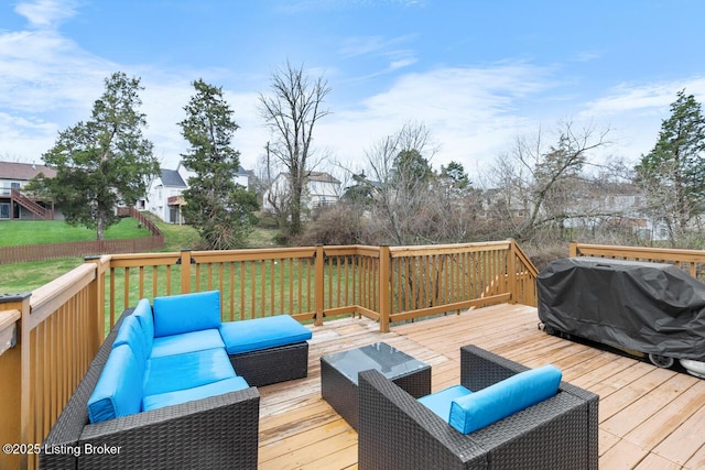 deck with an outdoor hangout area, a yard, and grilling area