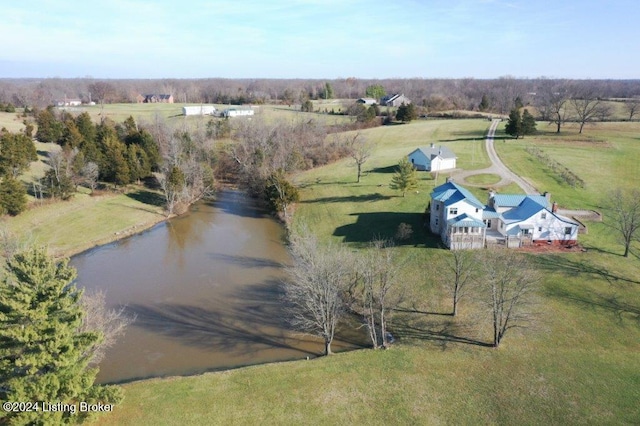 aerial view with a rural view and a water view