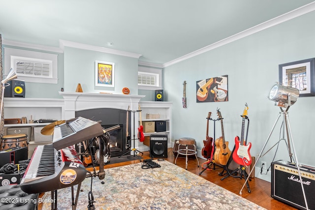 interior space with hardwood / wood-style flooring and ornamental molding