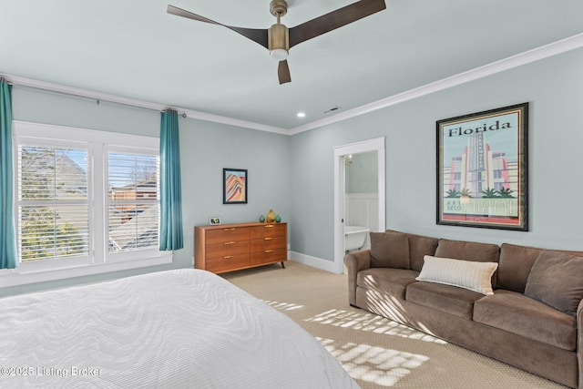 carpeted bedroom featuring ornamental molding and ceiling fan