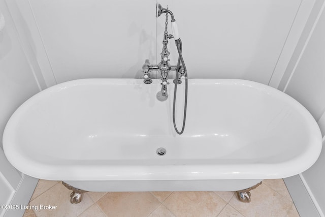 interior details featuring sink and a bath