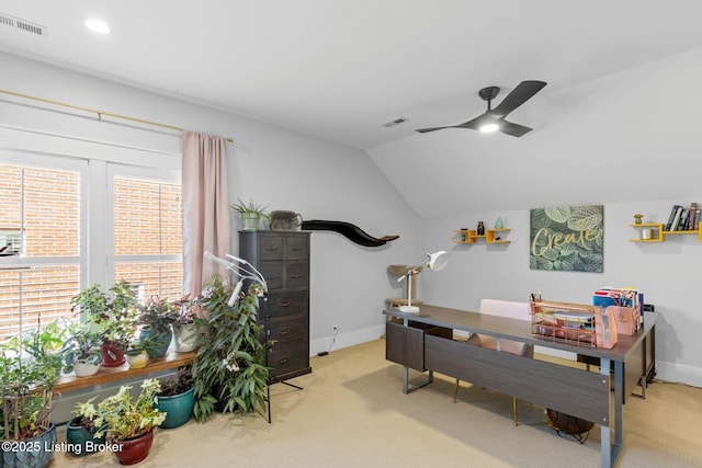 home office with lofted ceiling, light colored carpet, and ceiling fan