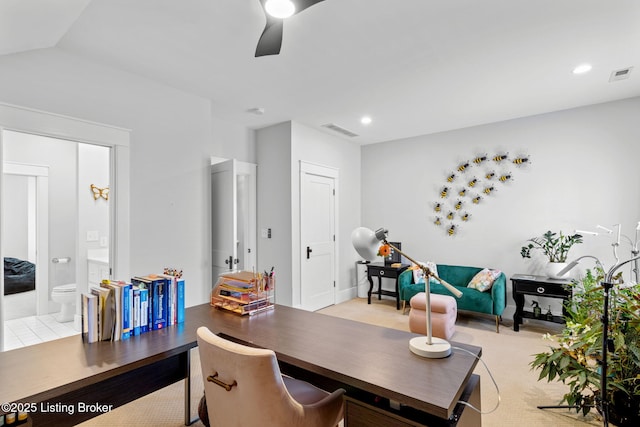 home office with vaulted ceiling and ceiling fan