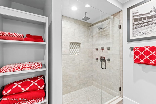 bathroom featuring an enclosed shower