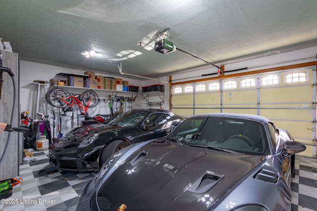 garage featuring a garage door opener