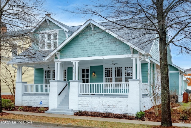 view of front of house featuring ceiling fan and covered porch