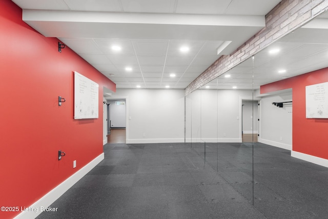 empty room with a paneled ceiling