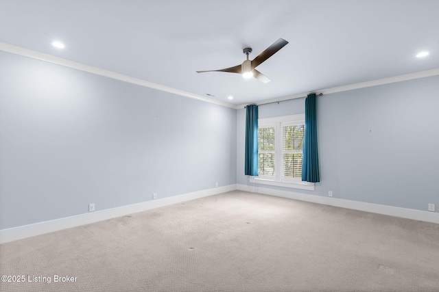 unfurnished room with ornamental molding, ceiling fan, and carpet flooring