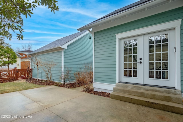 doorway to property featuring a patio and french doors