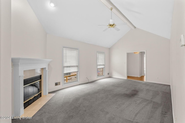 unfurnished living room with light carpet, high vaulted ceiling, ceiling fan, a fireplace, and beamed ceiling