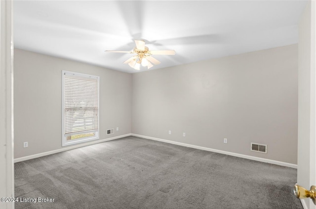 carpeted empty room with ceiling fan